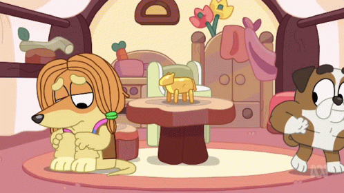 A Cartoon Of A Dog Sitting Next To A Table With A Sheep On It GIF