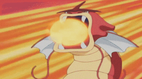 A Cartoon Of A Dragon With Its Mouth Open And A Fireball In It 'S Mouth GIF