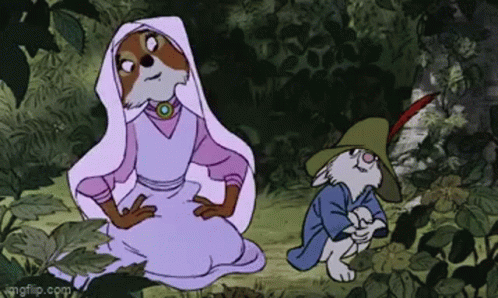 A Cartoon Of A Fox And A Rabbit In A Forest . GIF
