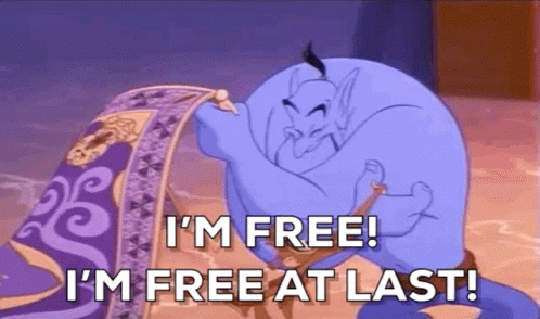 A Cartoon Of A Genie Saying `` I 'M Free At Last '' . GIF