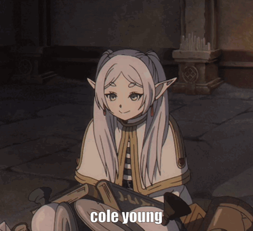 A Cartoon Of A Girl Holding A Cube With Cole Young Written Below Her GIF