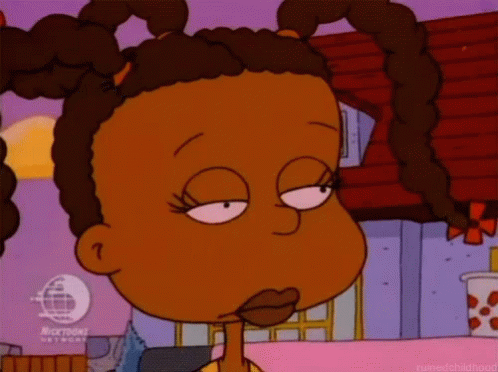 A Cartoon Of A Girl With Pigtails Making A Funny Face . GIF