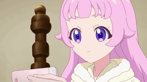 A Cartoon Of A Girl With Pink Hair Making A Shocked Face GIF