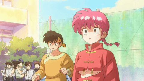 Girl With Pink Hair Next To Boy In Yellow GIF