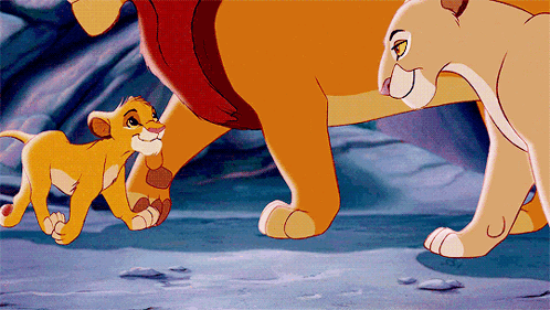 A Cartoon Of A Lioness Standing Next To A Baby Lioness GIF