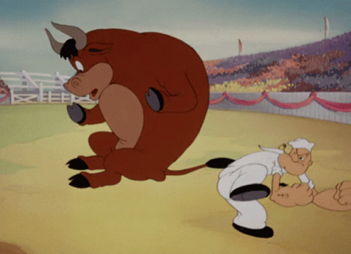 A Cartoon Of A Man And A Bull In A Stadium GIF