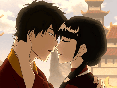 A Cartoon Of A Man And A Woman Kissing In Front Of A Building GIF