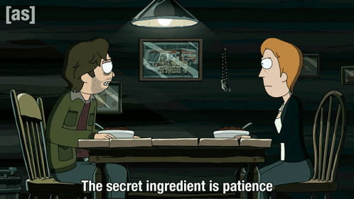 A Cartoon Of A Man And Woman Sitting At A Table With The Words The Secret Ingredient Is Patience GIF