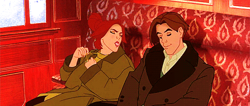 A Cartoon Of A Man And Woman Sitting On A Couch GIF