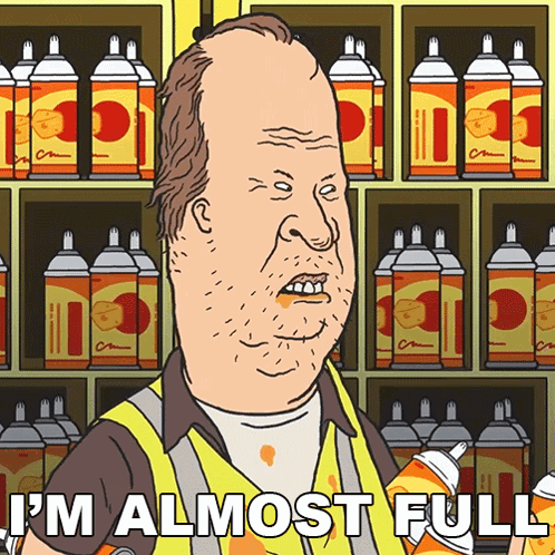 A Cartoon Of A Man Holding A Spray Can With The Words " I 'M Almost Full " Below Him GIF