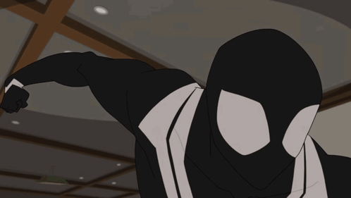 A Cartoon Of A Man In A Black Suit With A White Spider On It GIF