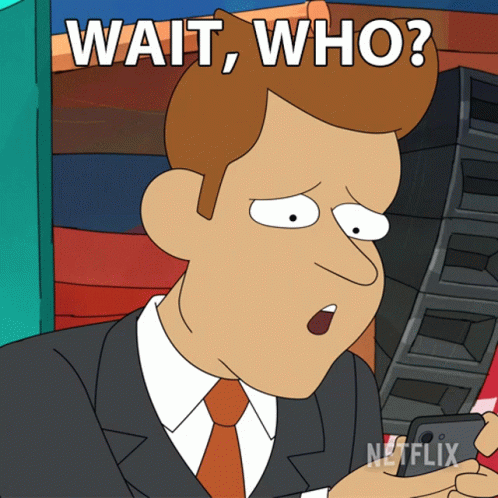 A Cartoon Of A Man In A Suit And Tie With The Words Wait Who GIF