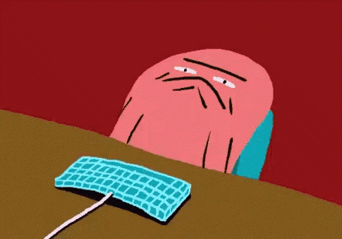 A Cartoon Of A Man Sitting At A Desk With A Keyboard GIF