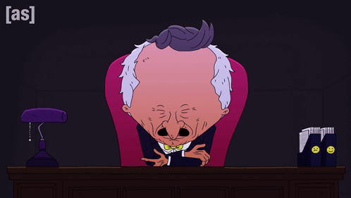 A Cartoon Of A Man Sitting At A Desk With The Letters A And S Below Him GIF