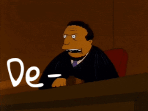 A Cartoon Of A Man Sitting At A Desk With The Words " De Nied " Written Above Him GIF