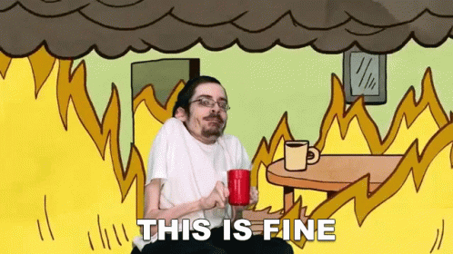 A Cartoon Of A Man Sitting In Front Of A Fire With The Words " This Is Fine " Above Him GIF