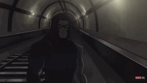 A Cartoon Of A Man Standing In A Tunnel With A Marvel Hq Logo Below Him GIF