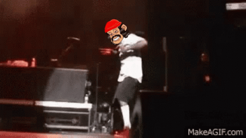 A Cartoon Of A Man Wearing A Red Hat Dancing On A Stage With The Website Makeagif.com In The Corner GIF