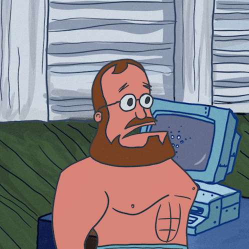 A Cartoon Of A Man With Glasses And A Beard Sitting In Front Of A Computer GIF