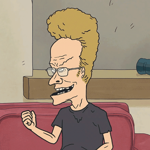 A Cartoon Of A Man With Glasses And A Mohawk GIF