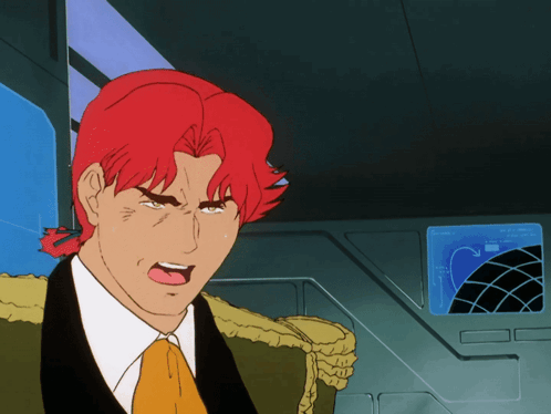 A Cartoon Of A Man With Red Hair Making A Face GIF