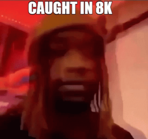 A Cartoon Of A Man With The Words Caught In 8K On Top Of Him GIF