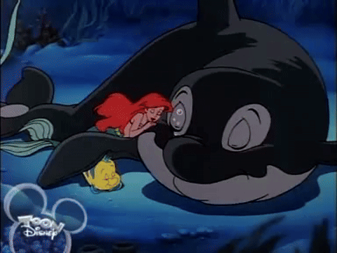 A Cartoon Of A Mermaid Laying On A Whale With A Toon Disney Logo Behind Them GIF