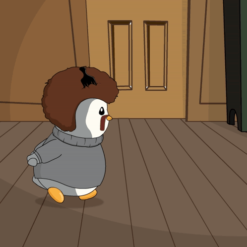 A Cartoon Of A Penguin Wearing A Sweater With The Letter N On Its Face GIF