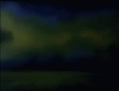 A Cartoon Of A Robot With A Red Light On It GIF
