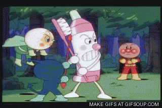 A Cartoon Of A Toothpaste Holding A Toothbrush Standing Next To An Anpanman GIF