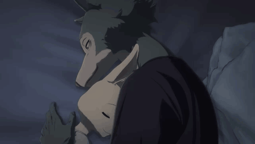 A Cartoon Of A Wolf Laying On A Person 'S Back GIF