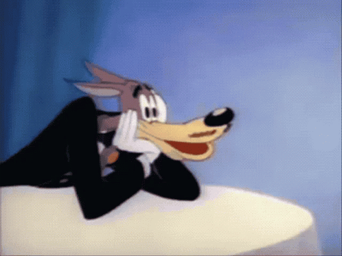 A Cartoon Of A Wolf Wearing A Tuxedo GIF