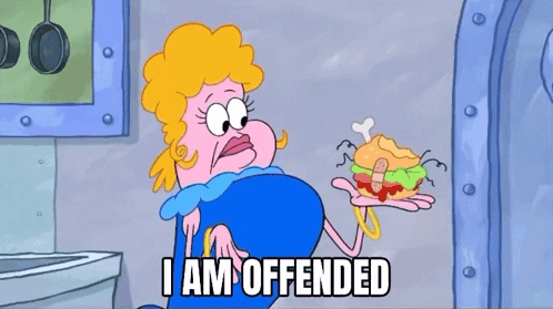 A Cartoon Of A Woman Holding A Sandwich With The Words " I Am Offended " Below Her GIF
