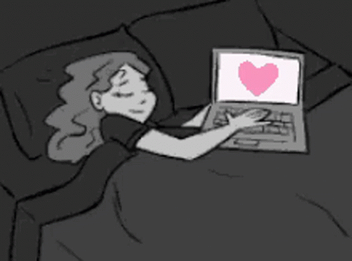 A Cartoon Of A Woman Laying In Bed Using A Laptop With A Heart On The Screen GIF
