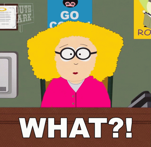 A Cartoon Of A Woman Sitting At A Desk With The Words " What ? " In Front Of Her GIF