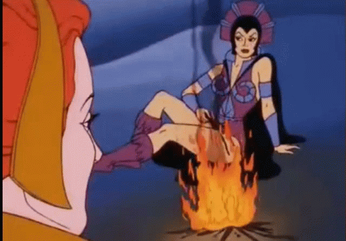 A Cartoon Of A Woman Sitting Next To A Fire With Her Legs Crossed . GIF