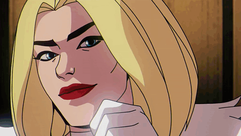 A Cartoon Of A Woman With Blonde Hair And Red Lipstick GIF
