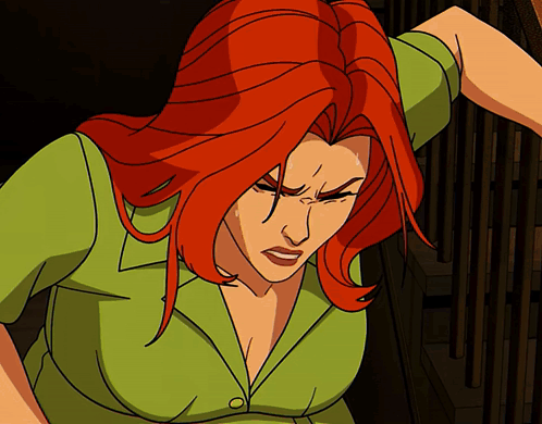 A Cartoon Of A Woman With Red Hair And A Green Top GIF