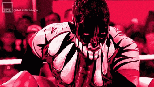 A Cartoon Of A Wrestler With His Hands On His Face In A Wrestling Ring . GIF