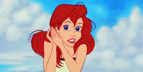 A Cartoon Of Ariel From The Little Mermaid Holding Her Hair In Her Hands . GIF