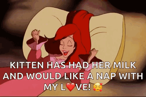 A Cartoon Of Ariel From The Little Mermaid Laying On A Bed GIF