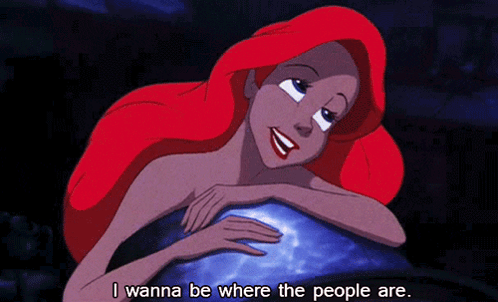 A Cartoon Of Ariel From The Little Mermaid Laying On A Rock With The Words I Wanna Be Where The People Are Below Her GIF