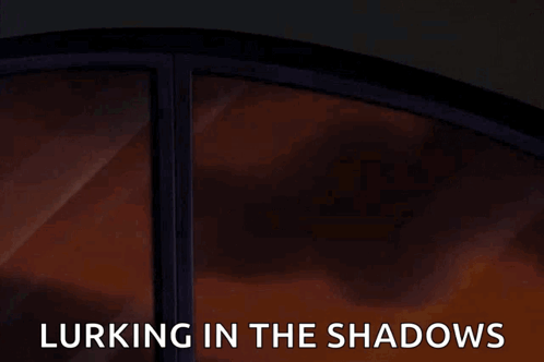 A Cartoon Of Batman Lurking In The Shadows Next To A Window GIF