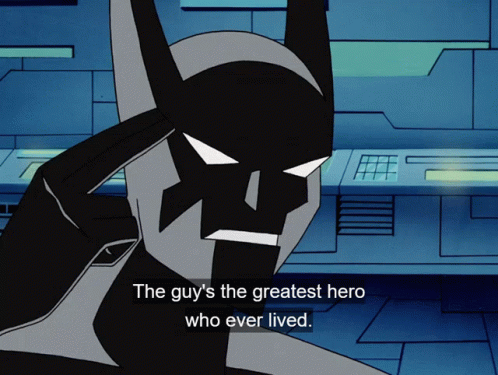 A Cartoon Of Batman With The Words " The Guy 'S The Greatest Hero Who Ever Lived " Below Him GIF