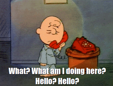 A Cartoon Of Charlie Brown Talking On A Red Phone GIF