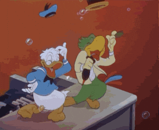 A Cartoon Of Donald Duck And A Green Duck Dancing On A Piano GIF