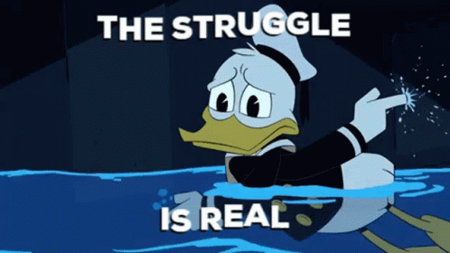 A Cartoon Of Donald Duck In The Water With The Words " The Struggle Is Real " Above Him GIF