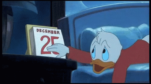 A Cartoon Of Donald Duck Looking At A Calendar That Says December 25 GIF