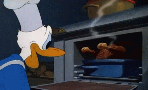 A Cartoon Of Donald Duck Looking At A Pot Of Food In An Oven GIF