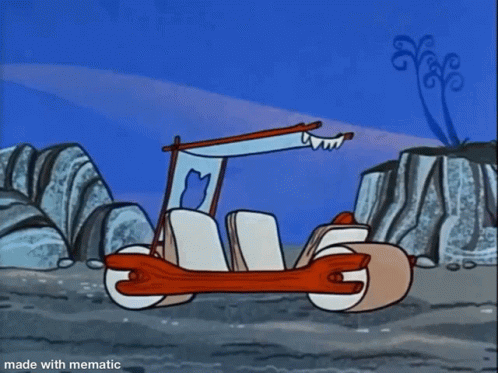 A Cartoon Of Flintstone Driving A Car With The Caption Made With Mematic GIF